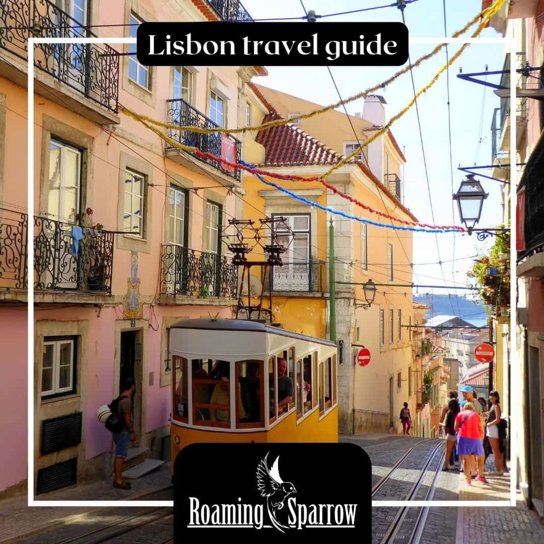 Lisbon travel guide - panoramic view of colorful Alfama neighborhood with traditional Portuguese architecture and Tagus River, showcasing best things to do in Lisbon