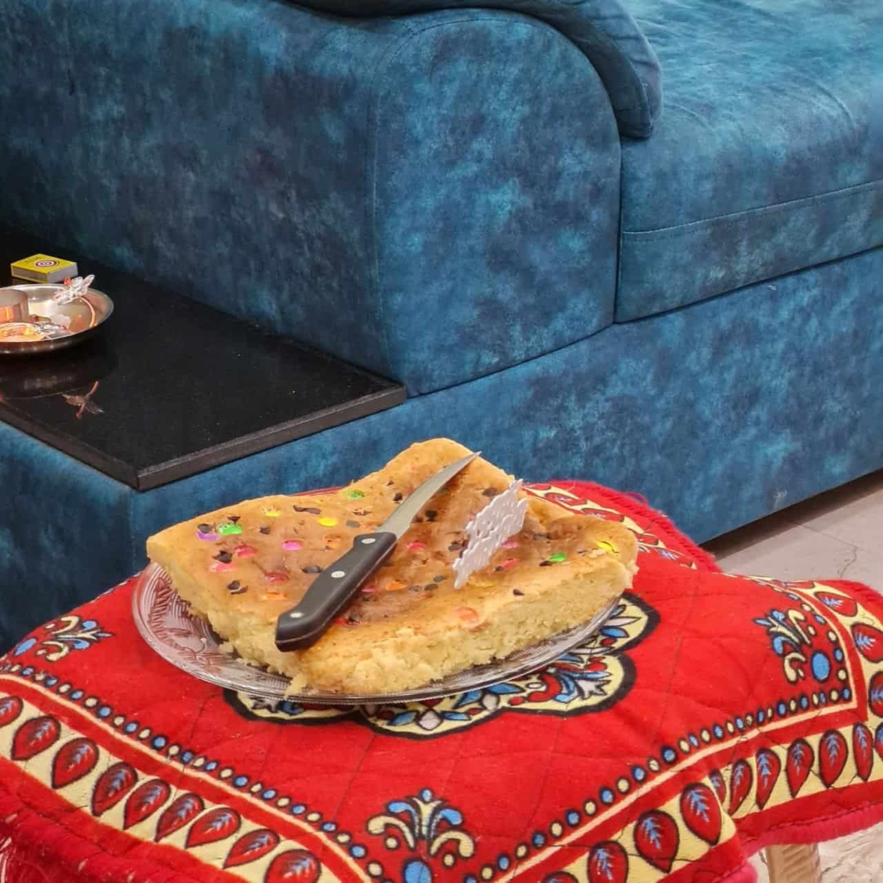 A yoga workaway in india: my month in pune 11 » 2026 » roaming sparrow Birthday celebration cake at Vikas and Shwetambari's teacher's home in India