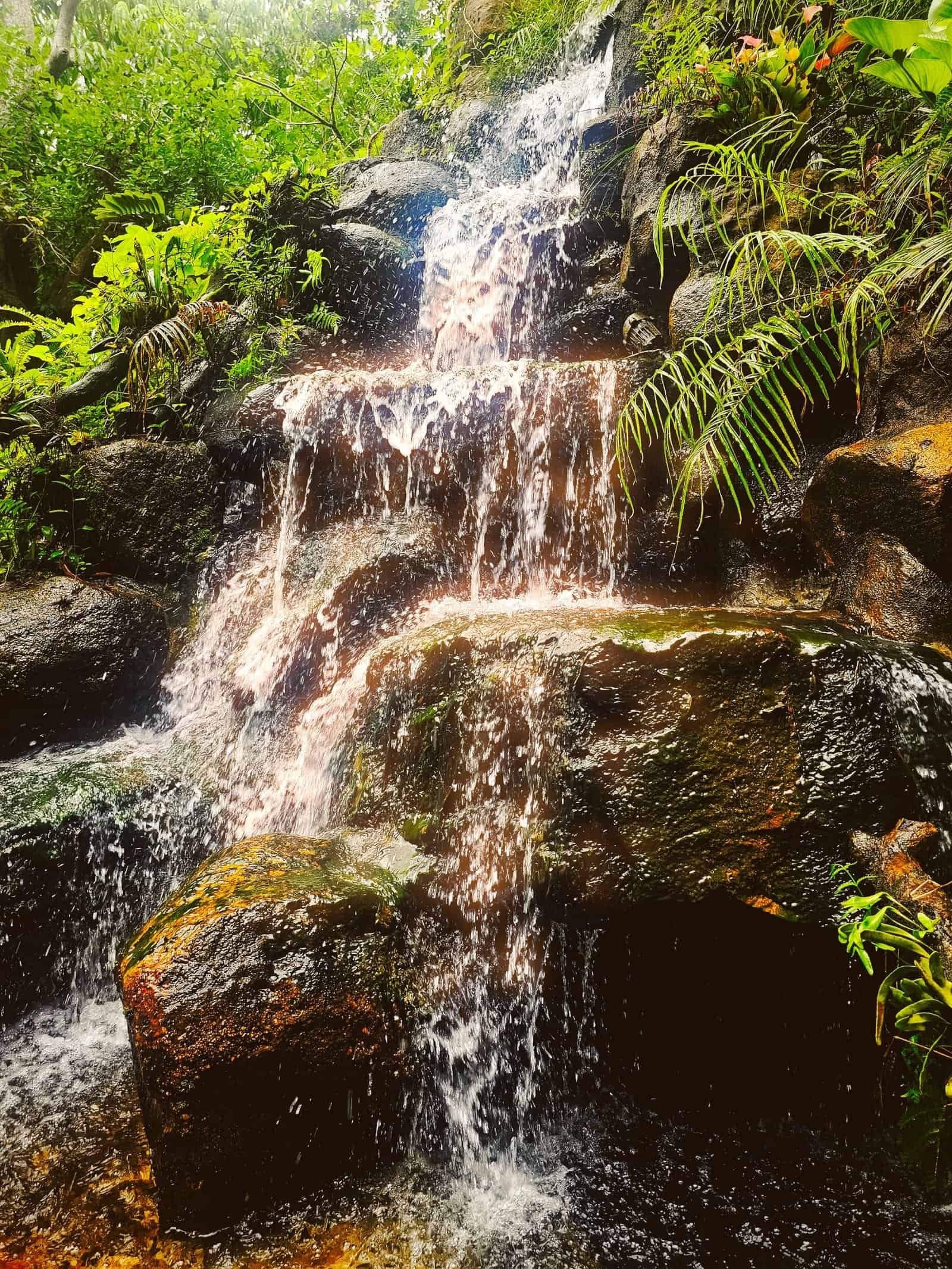 A man-made waterfall in the rock garden at Chesda cafe near Siem Reap