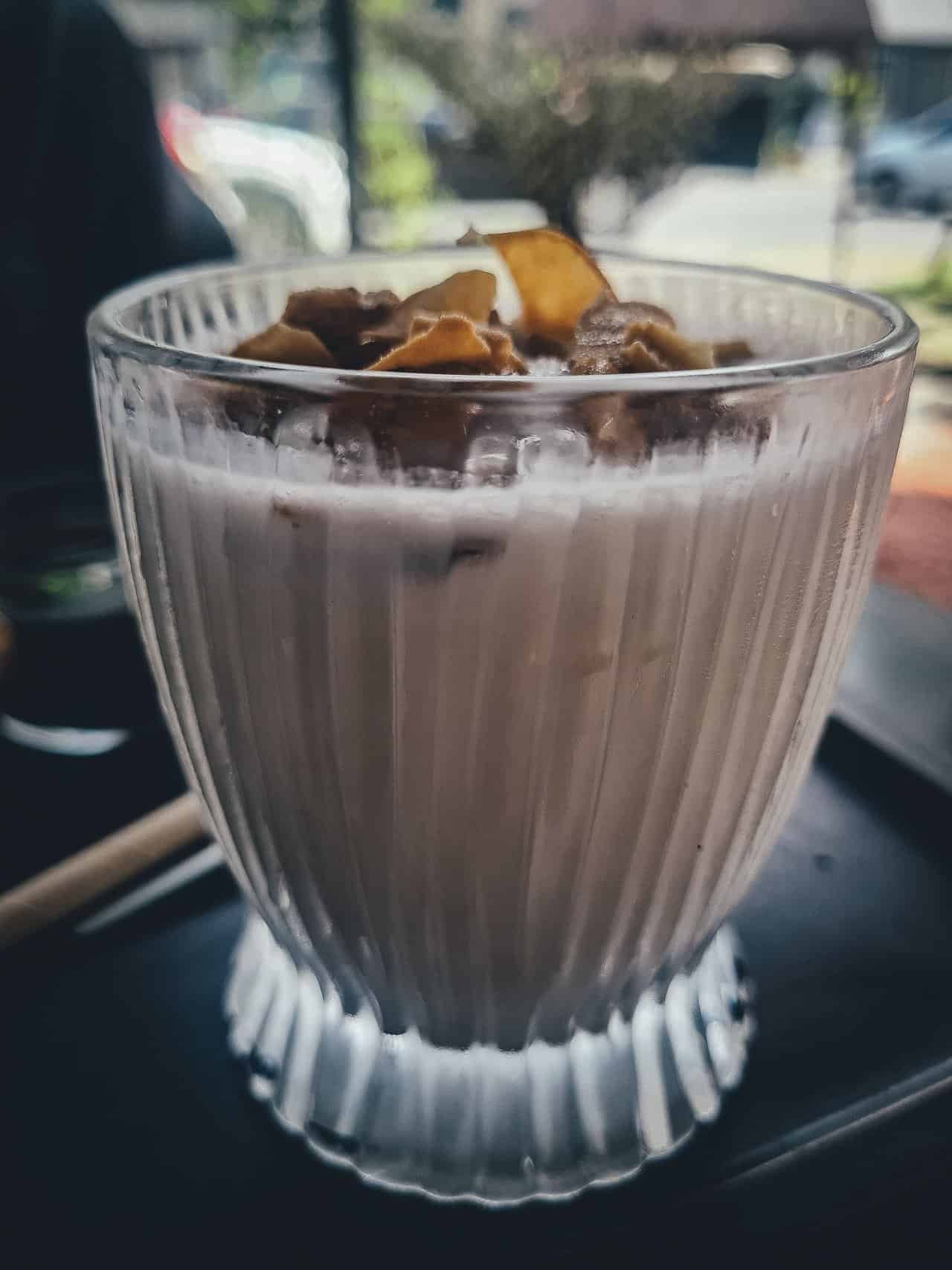 L stand coffee and tea: a charming coffee haven in danang, vietnam 16 » 2026 » roaming sparrow Love the Cocunut cofee