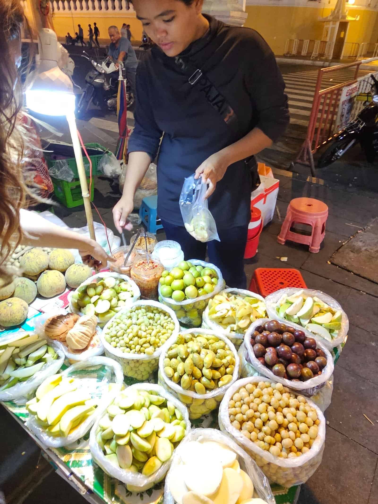Phnom penh on foot: bassac lane, the riverside, and a day of wandering 26 » 2026 » roaming sparrow A riverside street-food cart with simmering eggs and sauces in Phnom Penh
