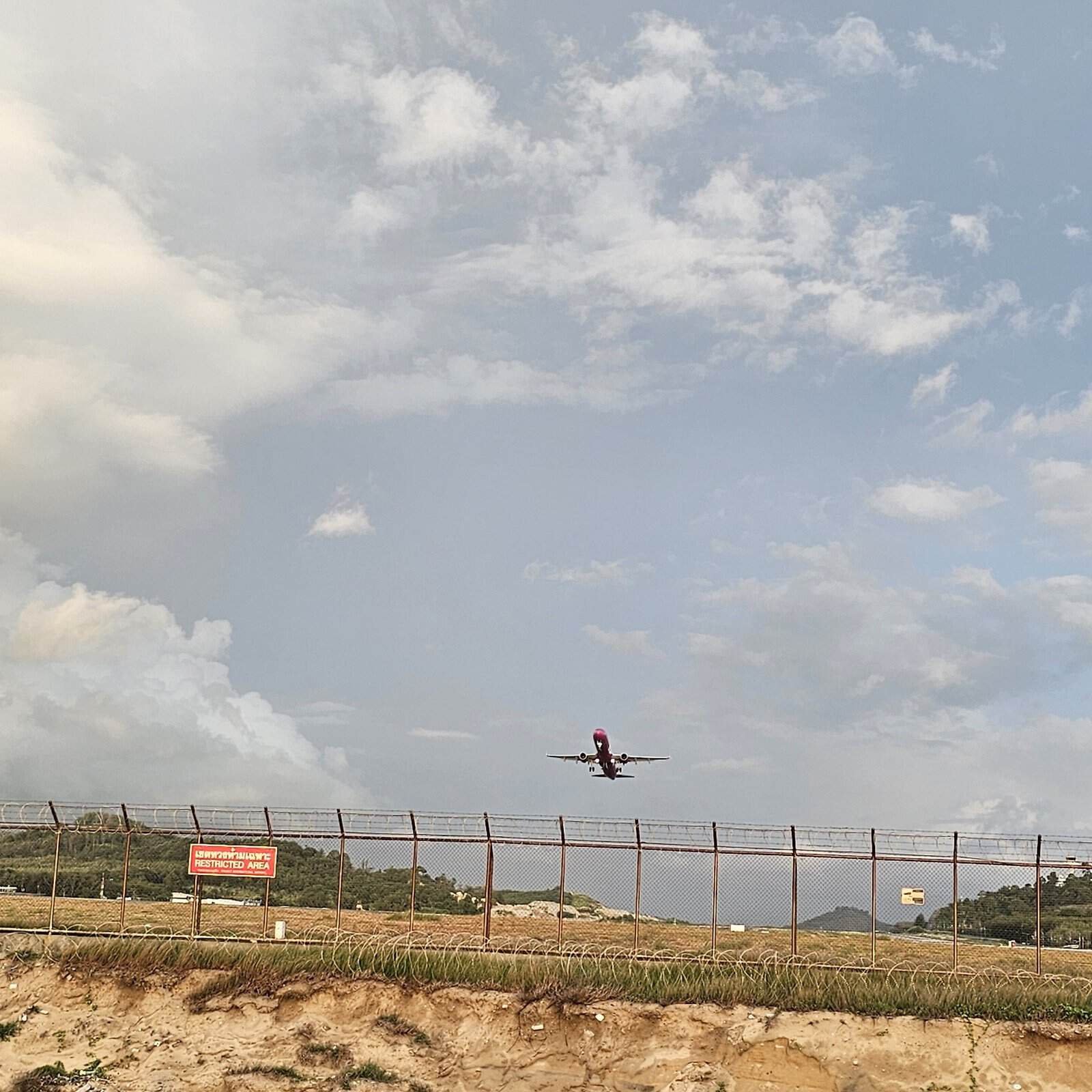 Phuket beaches and slow days: sunsets, coral, and quiet walks 17 » 2026 » roaming sparrow Mai Khao 'Airport Beach' at the end of the Phuket airport runway at sunset