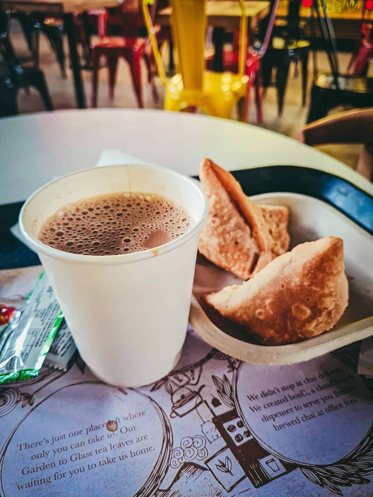 A yoga workaway in india: my month in pune 9 » 2026 » roaming sparrow Ginger chai and samosas from a street stand outside the airport in India